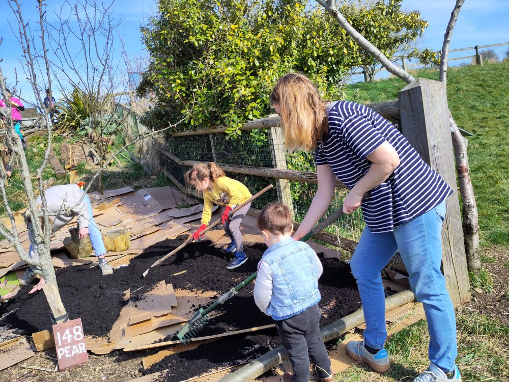 Volunteers planted a new edible forest garden at Hollingdean Park Community Orchard, March 2025